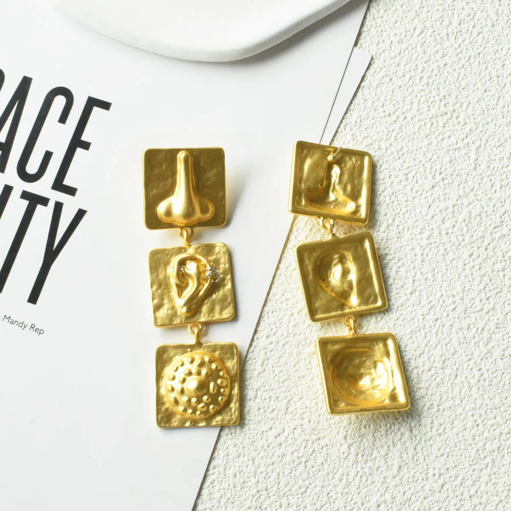 Gold Plated Face Nose Ears' Surrealist Dangle Earrings