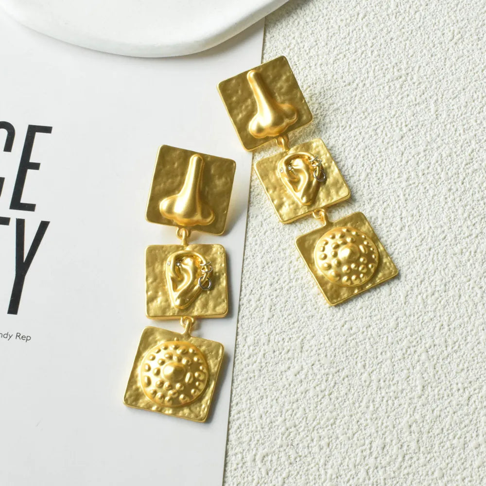 Gold Plated Face Nose Ears' Surrealist Dangle Earrings