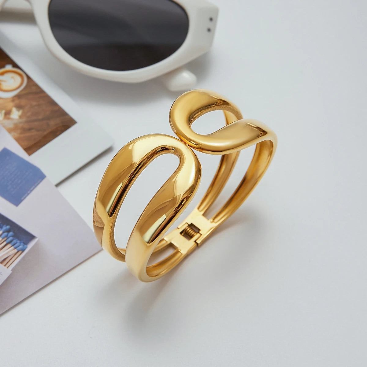 Elegant gold bracelet with modern open design perfect for everyday gold jewelry style