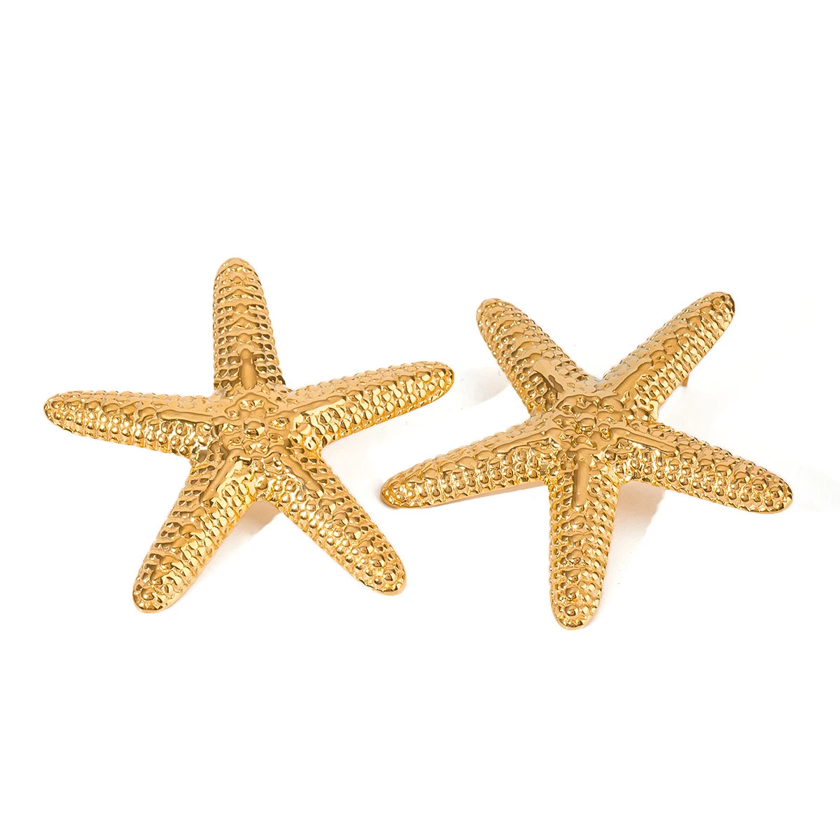 Gold plated earrings shaped like textured starfish with a shiny finish