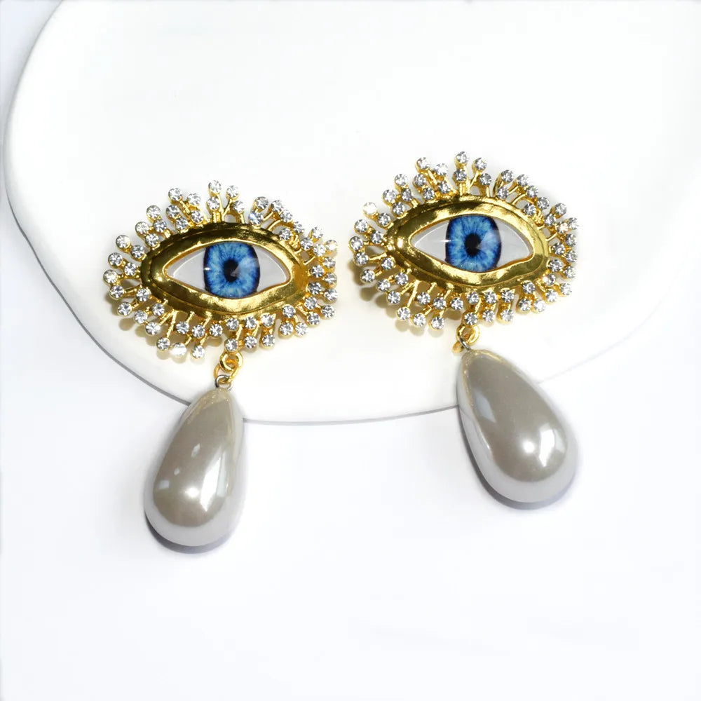 Blue Eyes Gold Plated Dangle Earrings