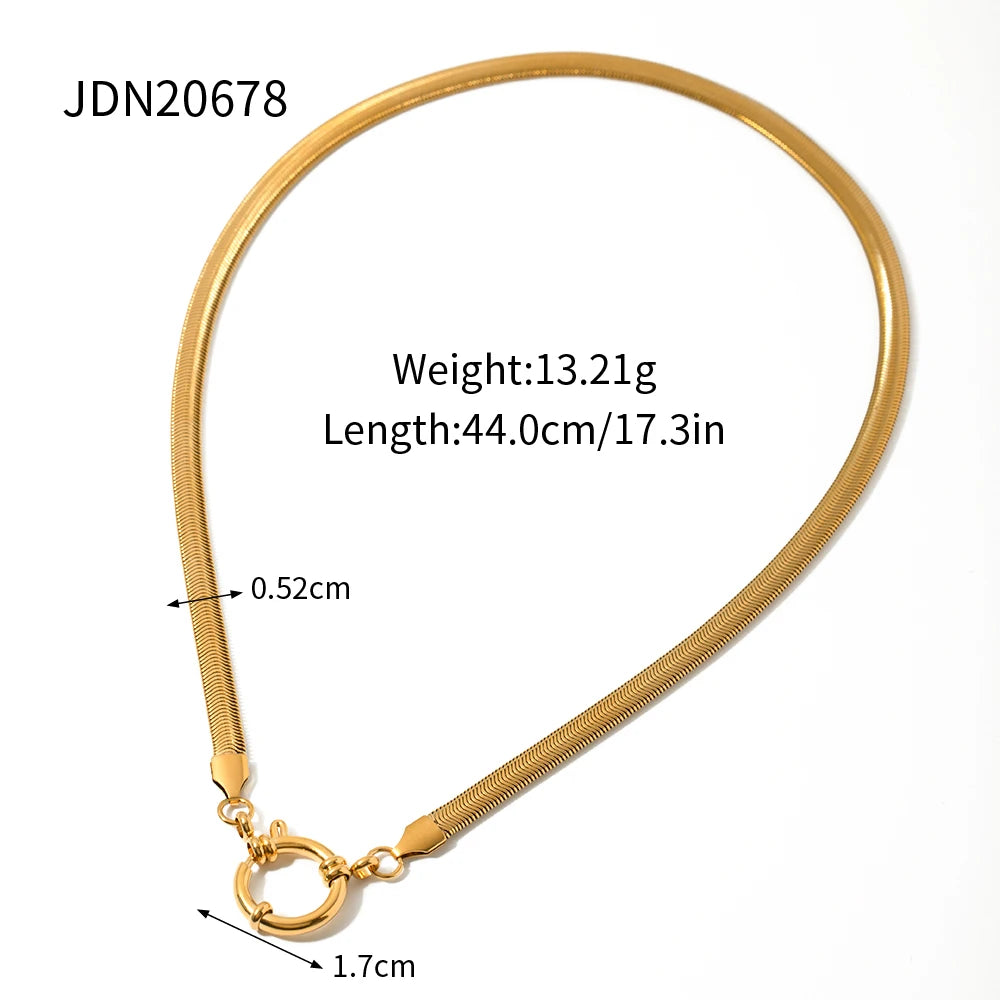 Bold gold statement necklace with sleek chain and round clasp measuring 44 cm length